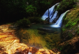 resun waterfall ( Lingga Island ) 