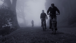 Riders on the misty Azores islands .  